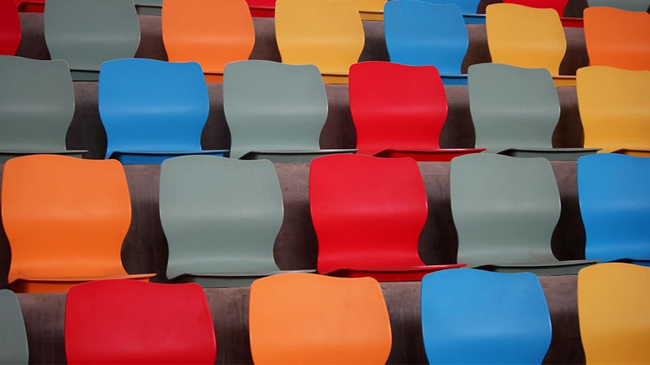 Eco-friendly recycled plastic chairs arranged in a stadium