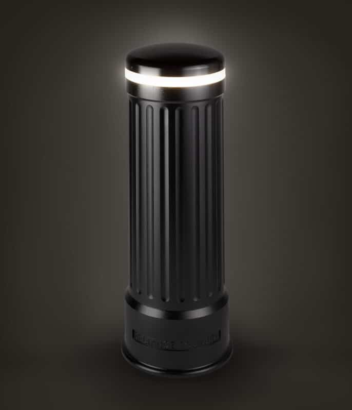 R-6501 Crescent Ward Light Bollard illuminated in a dark studio