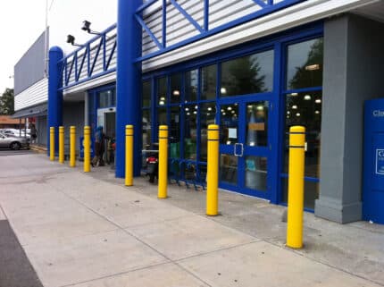 R-7120 plastic bollard covers protect building entrance