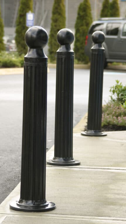Three R-7530 decorative bollards outdoors