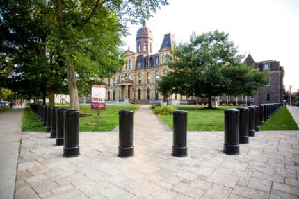 R-7535 decorative bollards at the entrance of large building