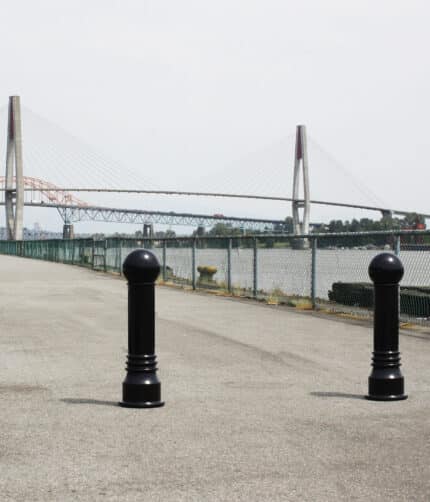 Two R-7555 decorative bollards on path