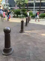 R-7582 decorative bollards on a busy sidewalk