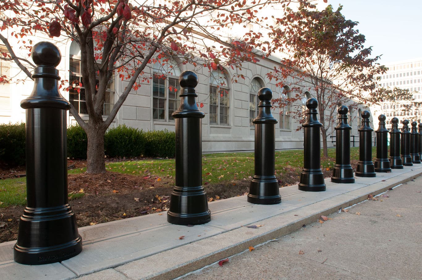 R-7593 decorative bollard in front of maple trees