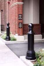 R-7595 decorative bollard guarding entranceway
