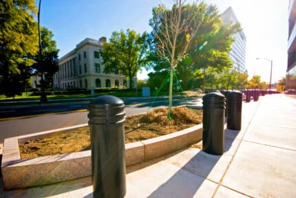 Black R-7736 decorative bollards in the sunlight