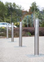 Four R-8460 stainless steel bollards