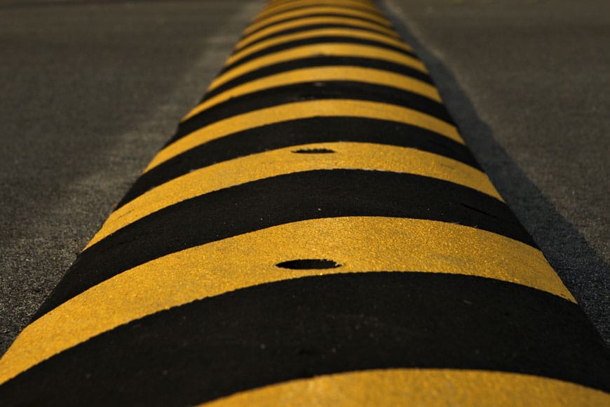 Speed bump on road